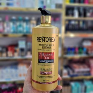 شامپو تغذيه كننده موهای خشك و آسيب ديده حاوی 7 روغن رستوركس 900 ميل
